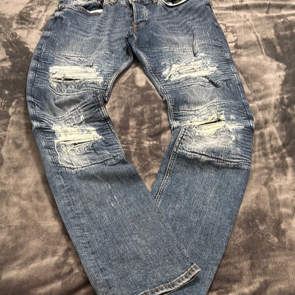 Divided Blue Relaxed Jeans with Distressed Design